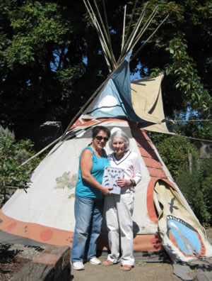 Winkie and D. Vail in front of D. Vails teepee